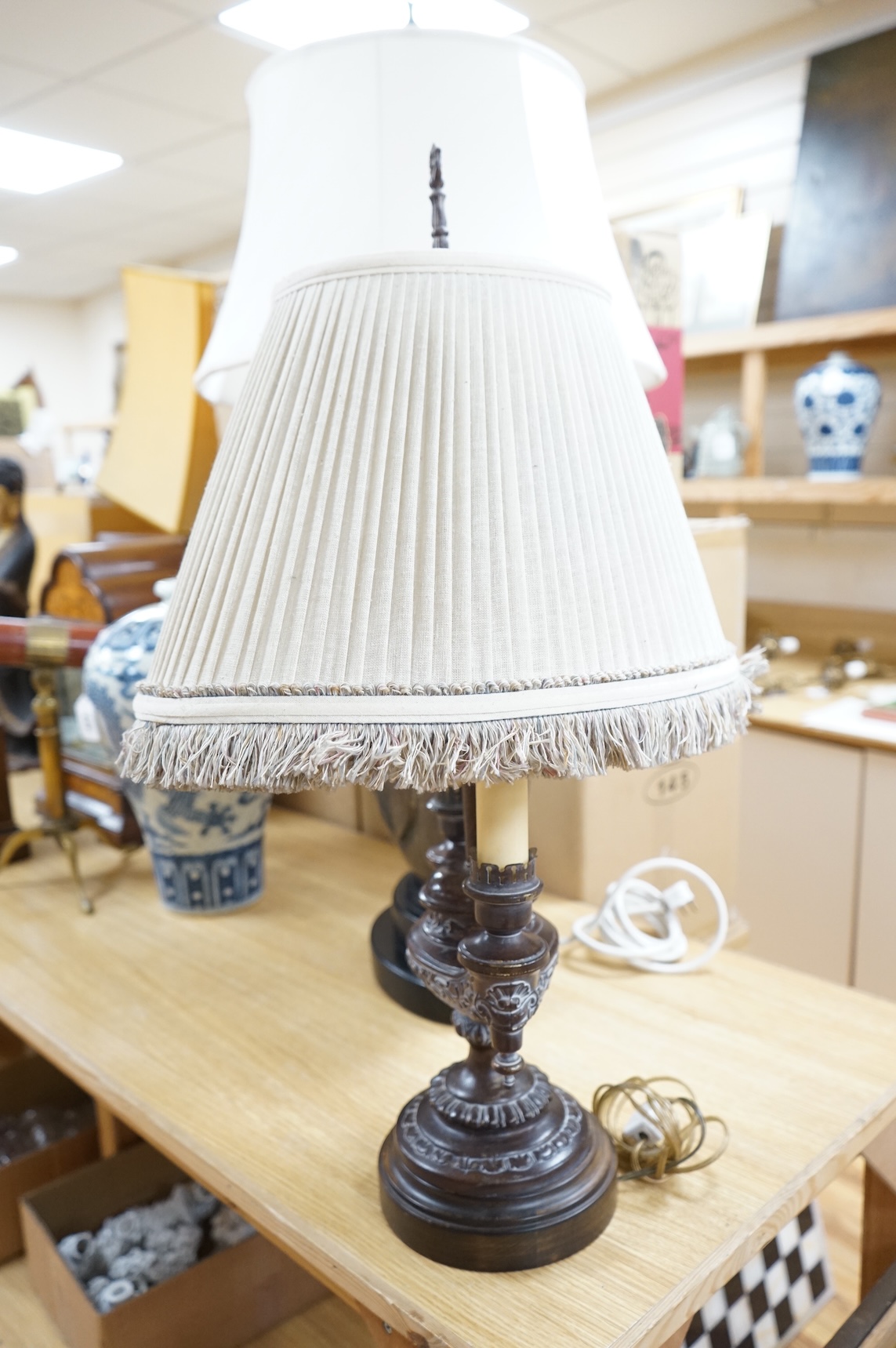 A Frederick Cooper Bouillotte lamp, together with a hammered metal table lamp, formed from a water flask (2)